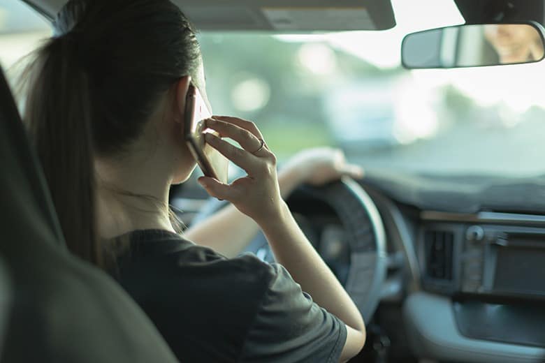 woman-on-cell-phone-while-driving-distracted