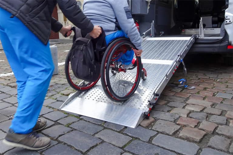 woman-in-wheelchair-ramp-van