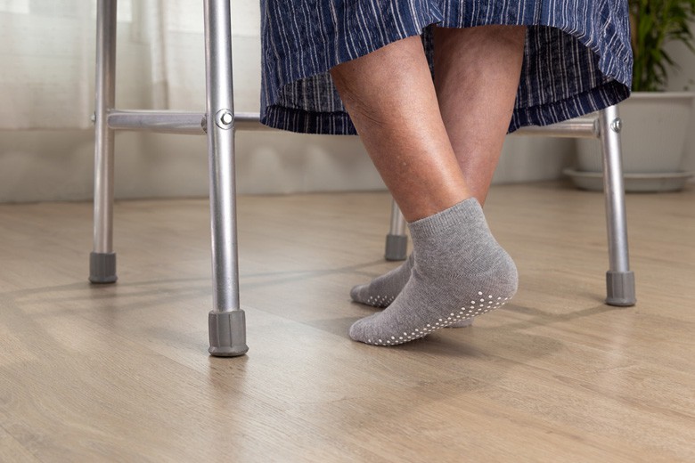 elderly-nursing-home-resident-with-walker-wearing-non-slip-socks